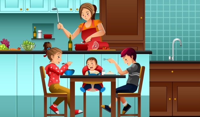 Wife-Cooking-For-Family-In-Kitchen